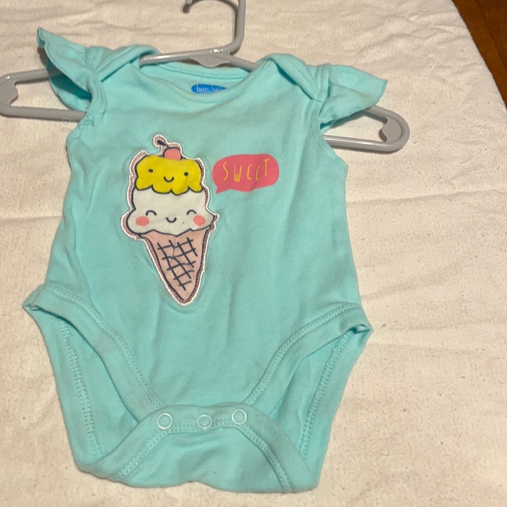 Blue onesie with a ice cream cone